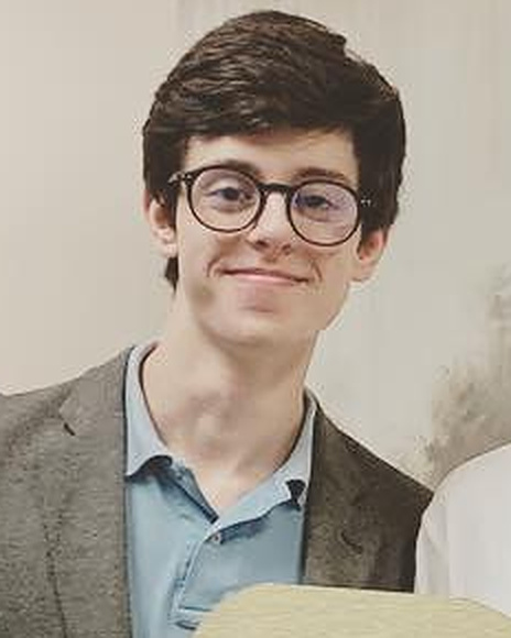 Collin Wheat, Agent at Wheat Real Estate, grey sport coat and glasses
